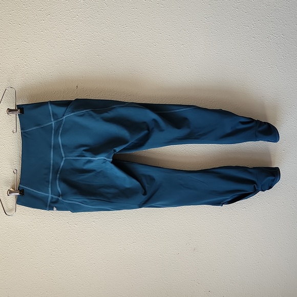 Fabletics Oasis High Waisted Twist 7/8 Leggings Midnight Wave Teal Activewear - Picture 2 of 12